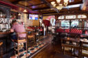 Interior of pub and bar area during the day. 